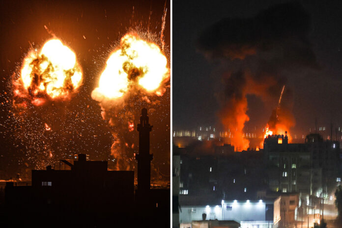 Explosions light-up the night sky above buildings in Gaza City.